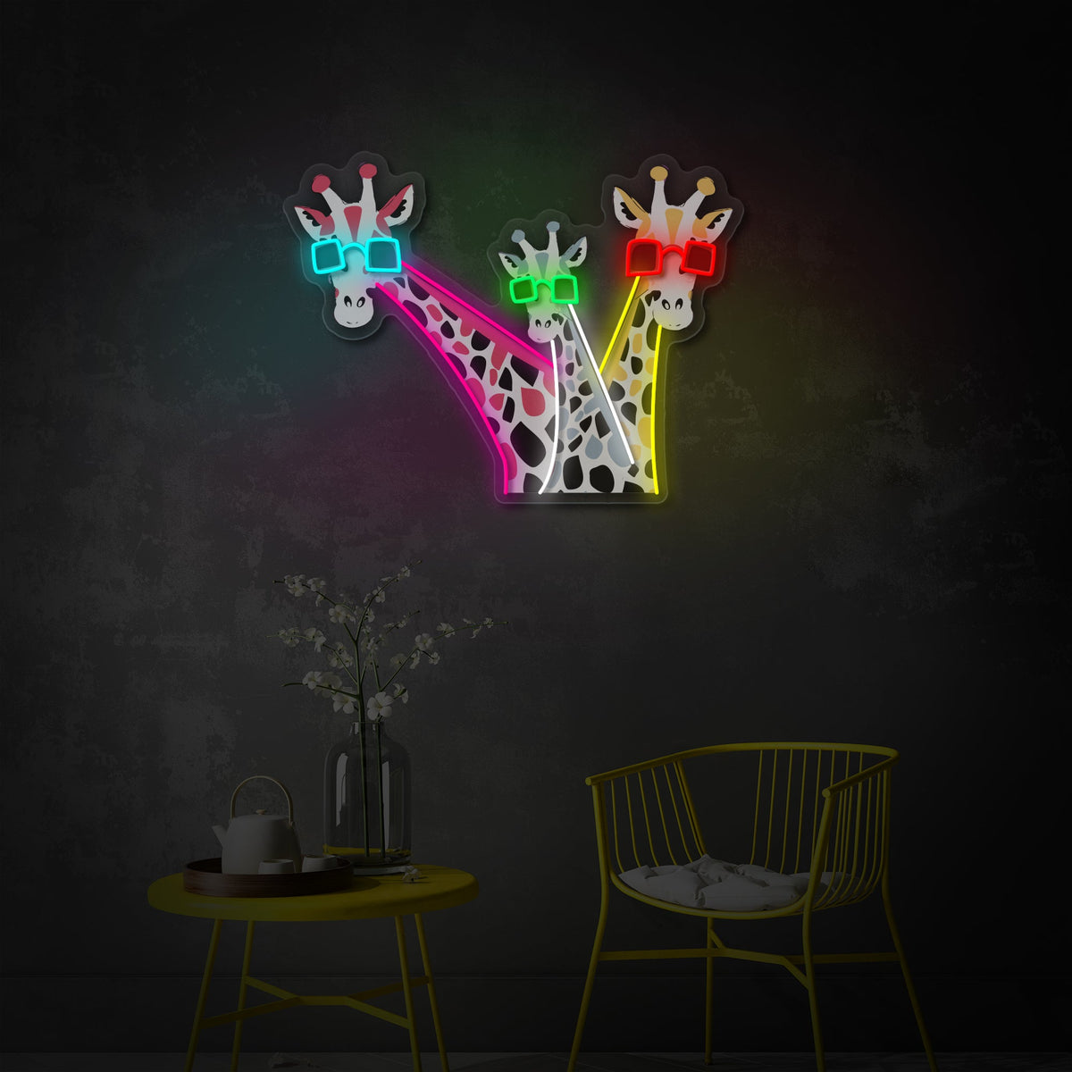 Insegna neon LED con tre giraffe colorate e occhiali luminosi